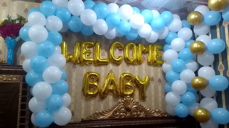 Blue and white balloon arch with gold Welcome Baby foil letters – Events In Sialkot