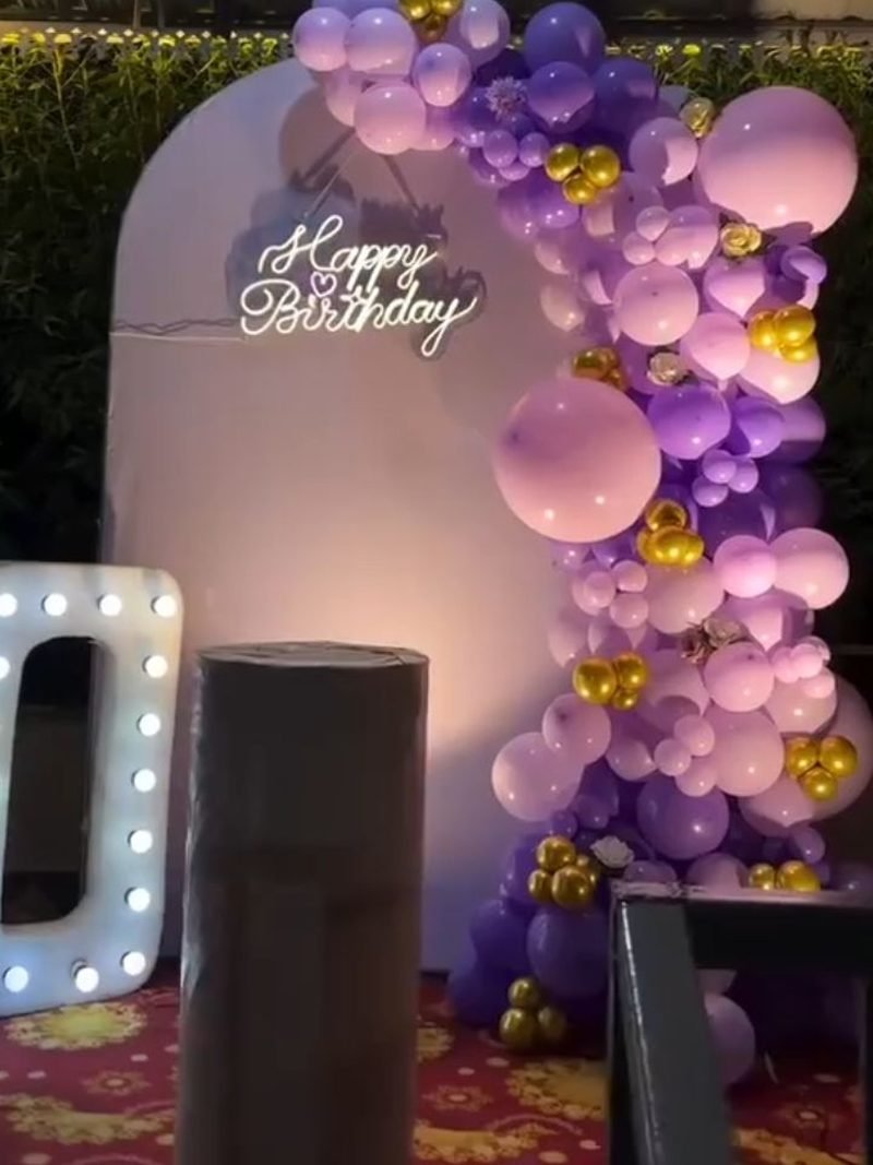 Purple and gold balloon arch with neon Happy Birthday sign – Events In Sialkot