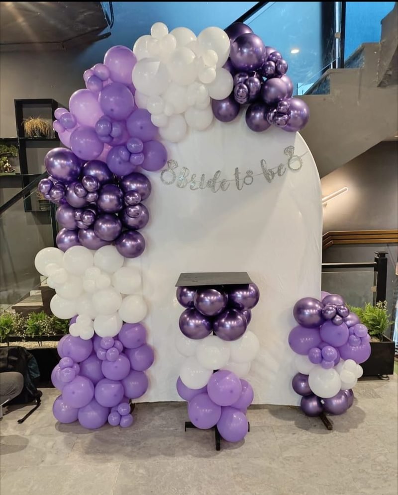 Purple, white and silver balloon arch with a Bride to be banner – Events In Sialkot