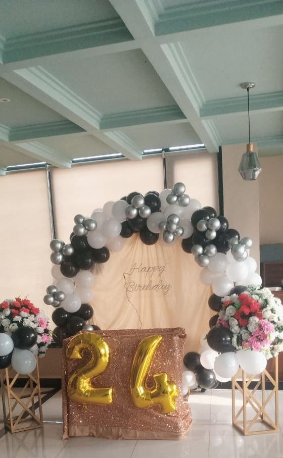 White and orange birthday balloon decoration in Sialkot – Events In Sialkot
