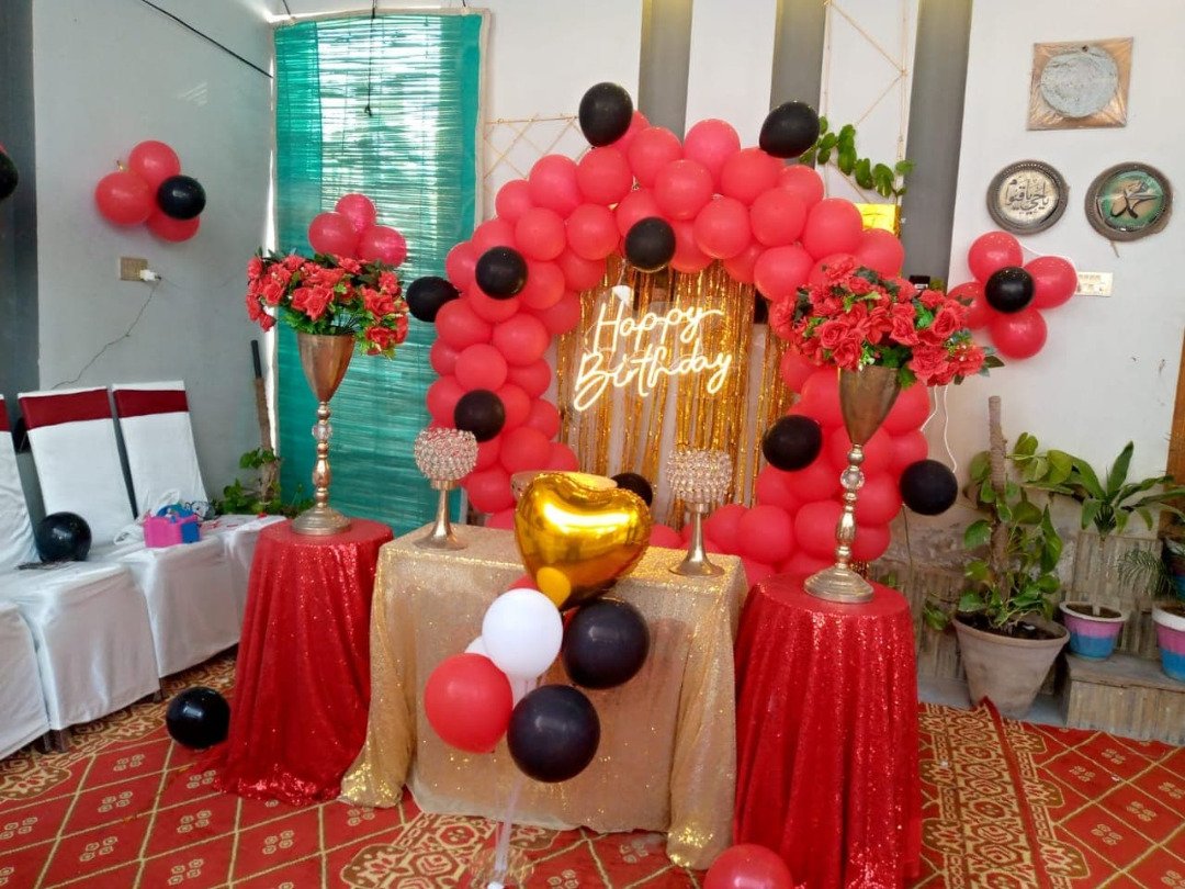 Red and orange birthday balloon decoration in Sialkot – Events In Sialkot