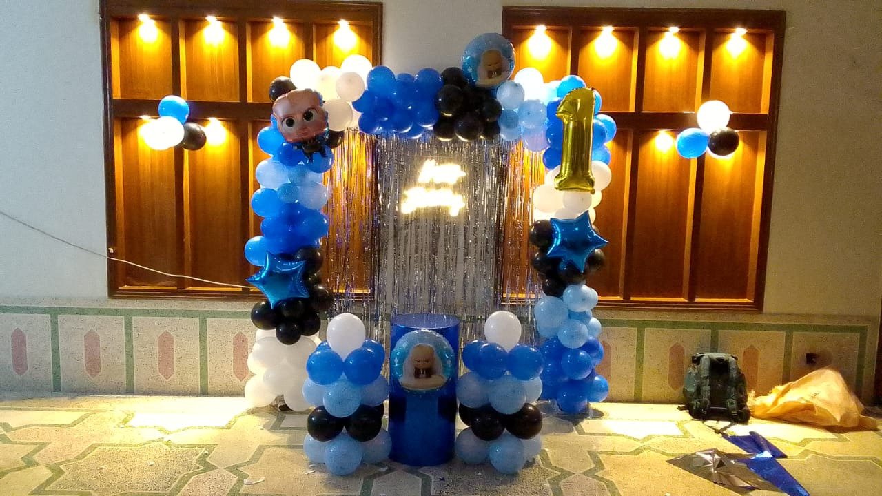 Orange and gold birthday balloon decoration in Sialkot – Events In Sialkot