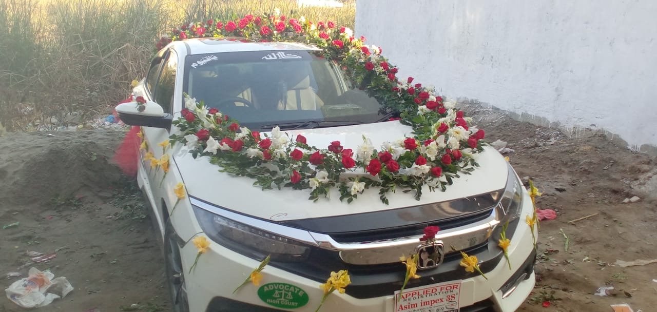 White wedding car flower decoration in Sialkot – Events In Sialkot