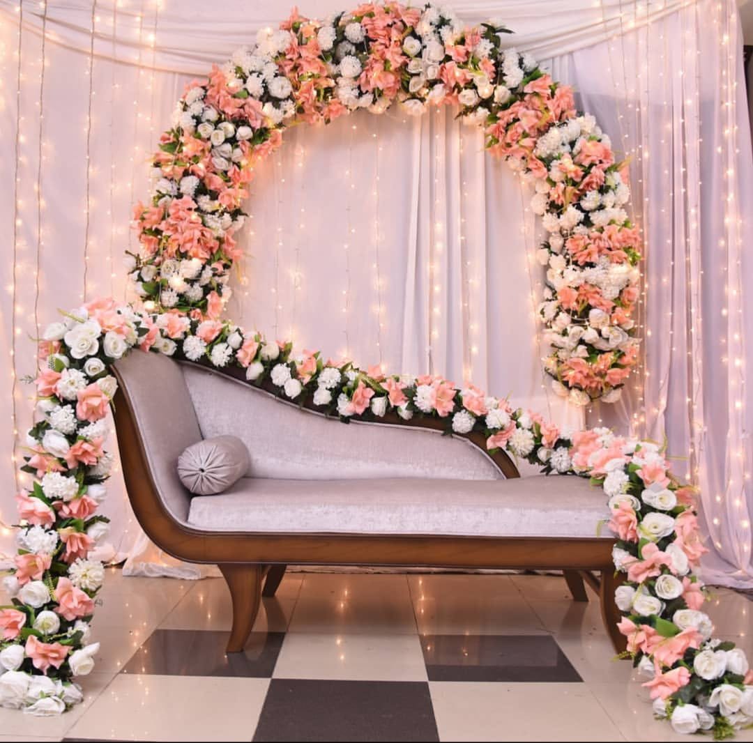 White and orange floral backdrop decor with fairy lights in Sialkot – Events In Sialkot