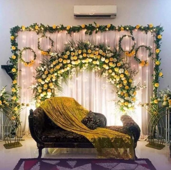 Gold and white floral backdrop decor with fairy lights in Sialkot – Events In Sialkot