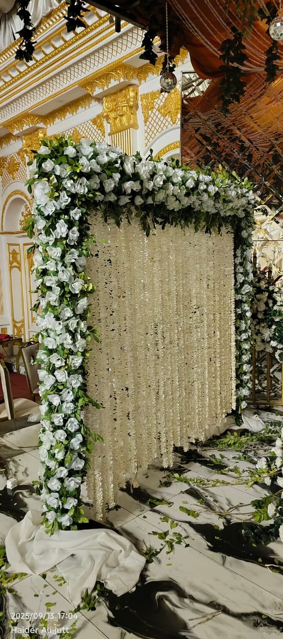 Gold and orange floral backdrop decor with fairy lights in Sialkot – Events In Sialkot