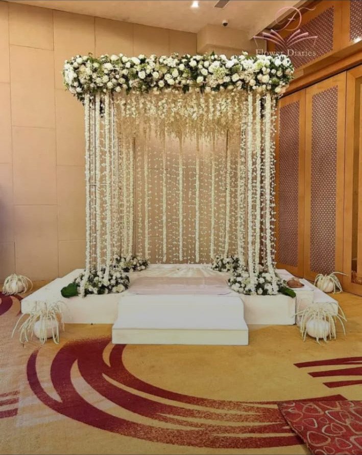 Orange and maroon floral backdrop decor with fairy lights in Sialkot – Events In Sialkot