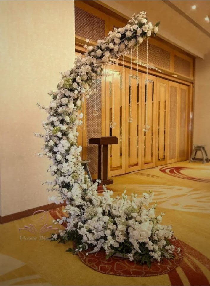 Orange floral backdrop decor with fairy lights in Sialkot – Events In Sialkot