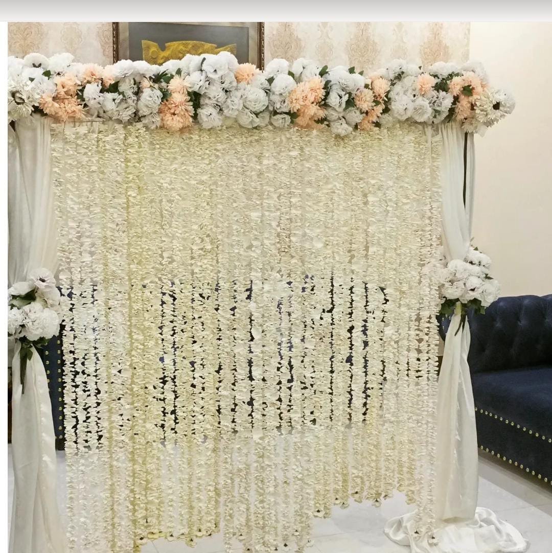 White floral backdrop decor with fairy lights in Sialkot – Events In Sialkot
