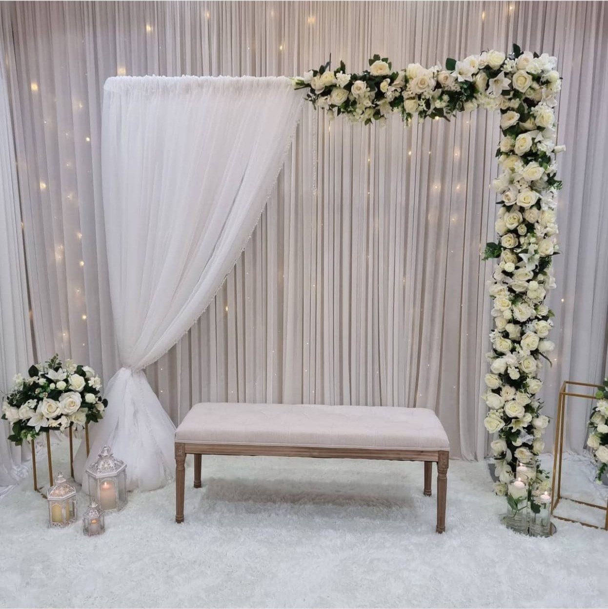 White floral backdrop decor with fairy lights in Sialkot – Events In Sialkot