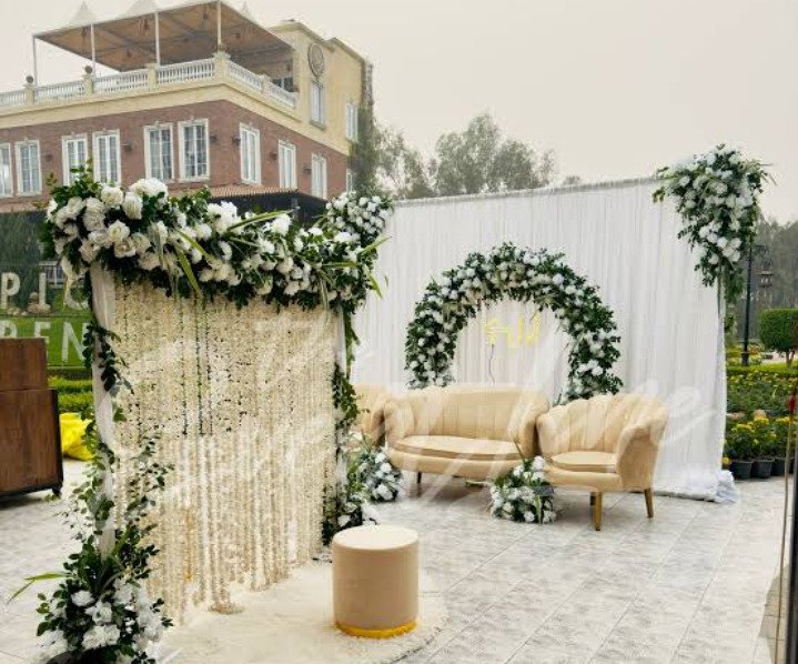 White floral backdrop decor with fairy lights in Sialkot – Events In Sialkot