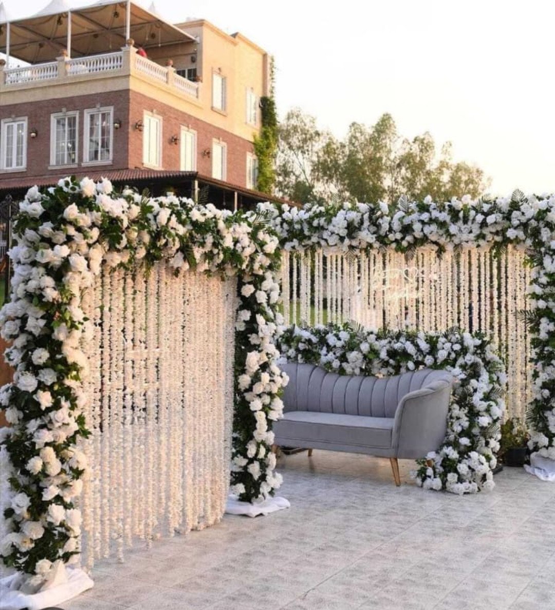 White floral backdrop decor with fairy lights in Sialkot – Events In Sialkot