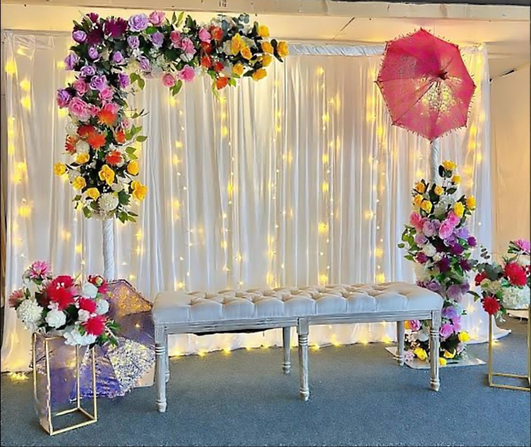 Orange and blue floral backdrop decor with fairy lights in Sialkot – Events In Sialkot