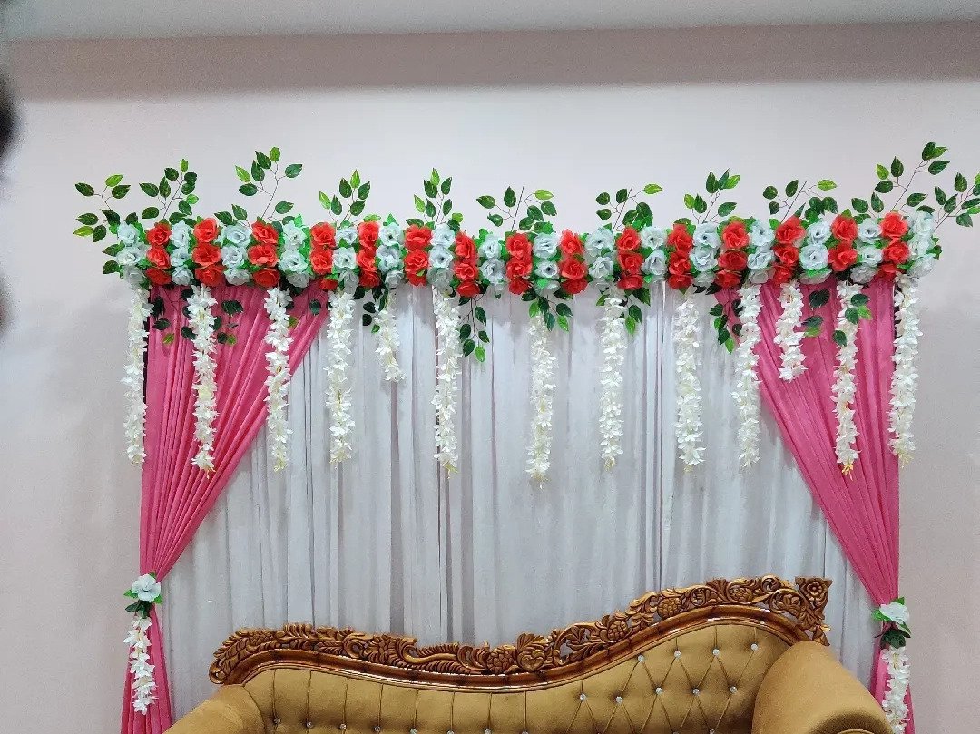 White and pink floral backdrop decor with fairy lights in Sialkot – Events In Sialkot
