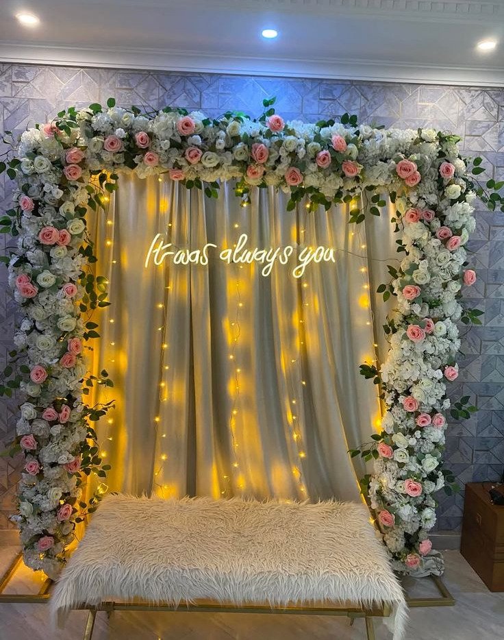 Gold and orange floral backdrop decor with fairy lights in Sialkot – Events In Sialkot