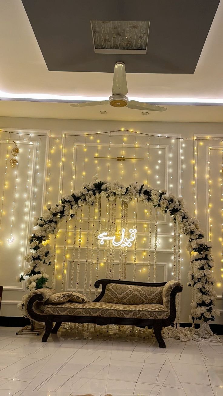 Gold and orange floral backdrop decor with fairy lights in Sialkot – Events In Sialkot
