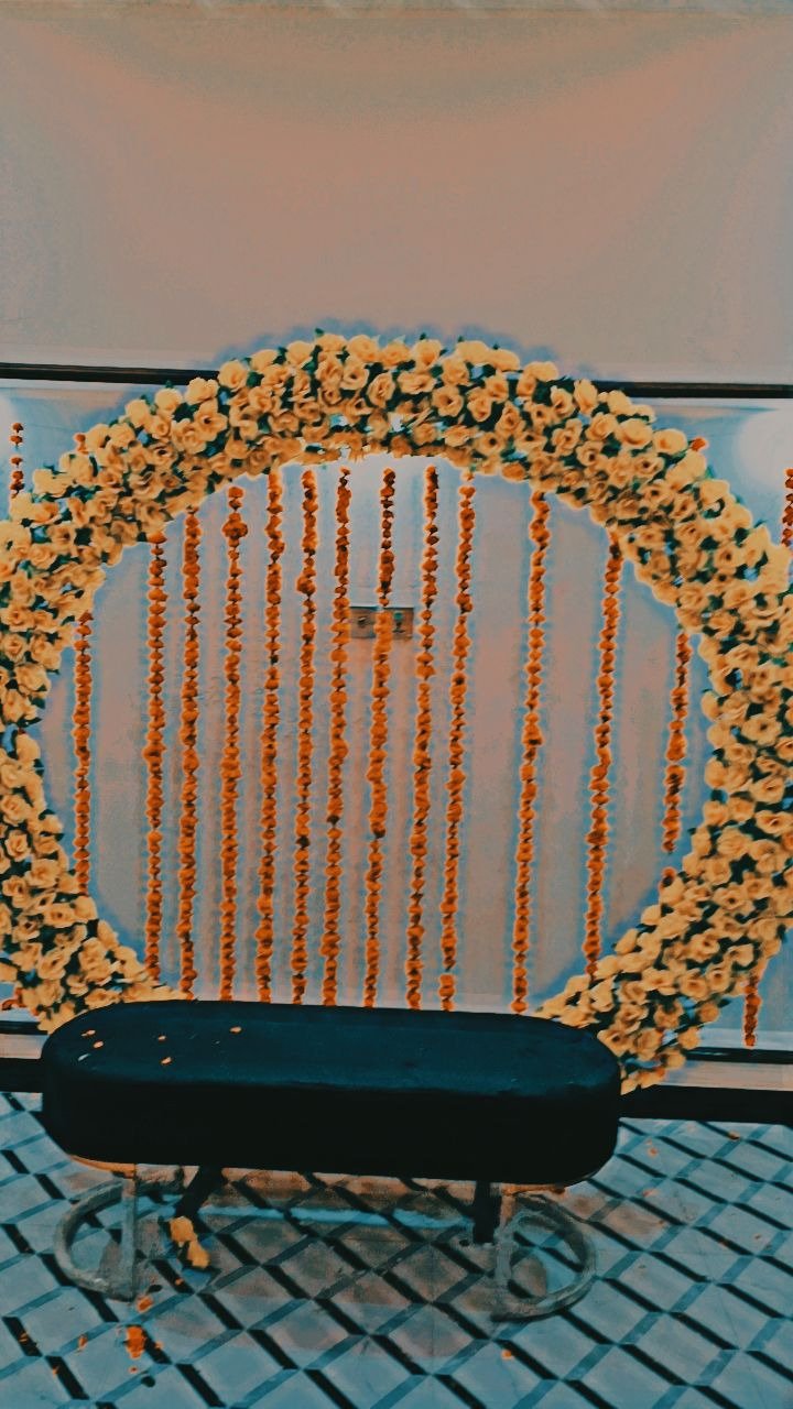 Orange and teal mehndi stage decoration in Sialkot – Events In Sialkot