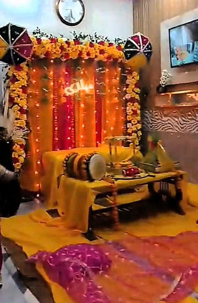 Orange and red mehndi stage decoration in Sialkot – Events In Sialkot