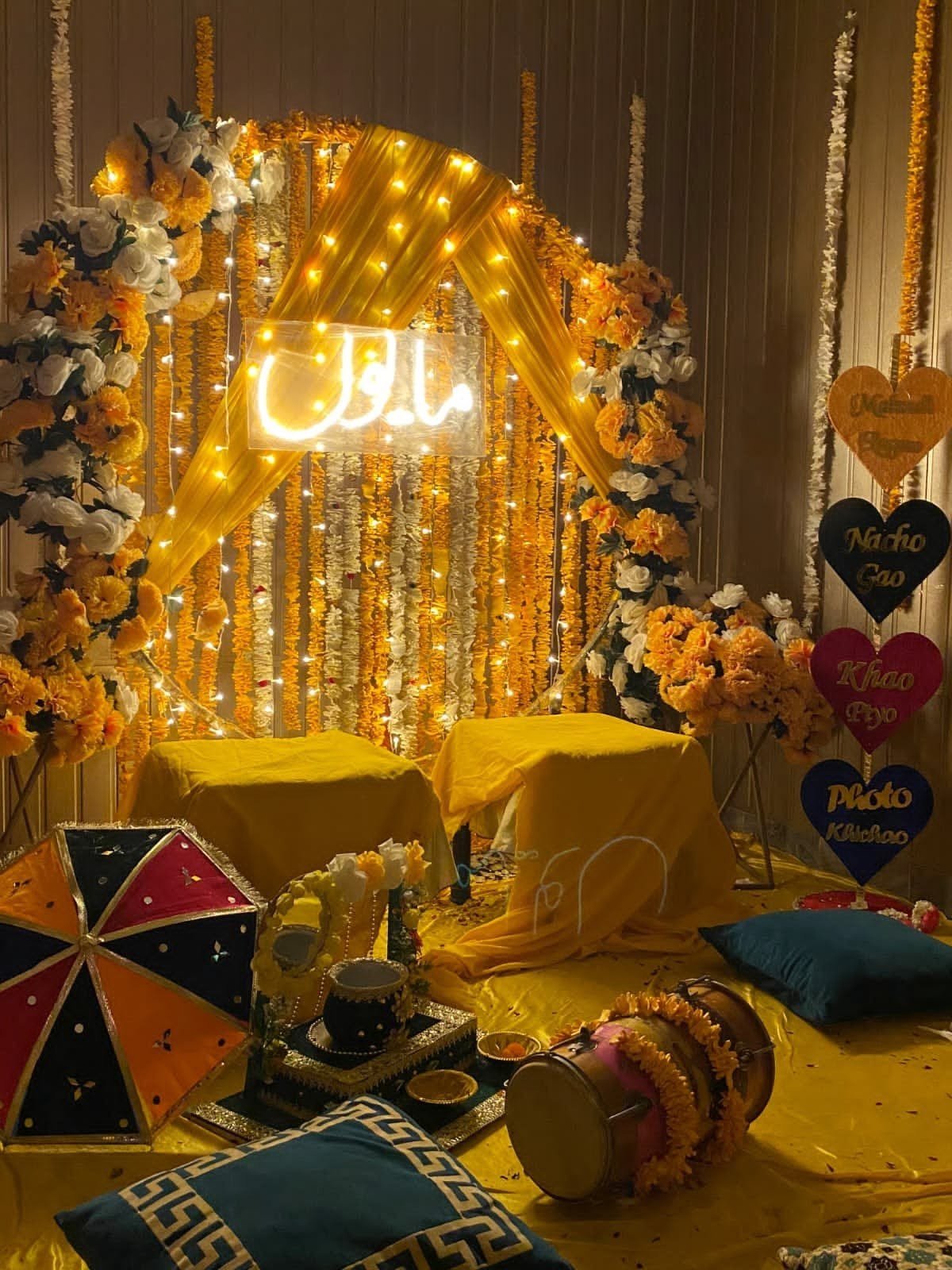 Orange and gold mehndi stage decoration in Sialkot – Events In Sialkot