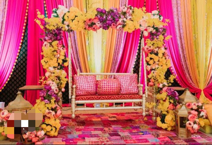Pink and orange mehndi stage decoration in Sialkot – Events In Sialkot