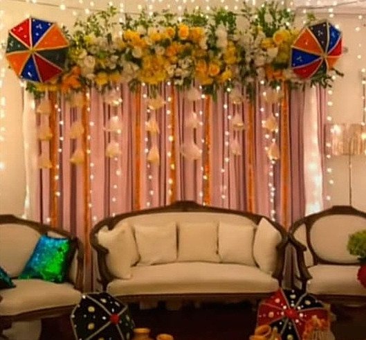 Orange mehndi stage decoration in Sialkot – Events In Sialkot