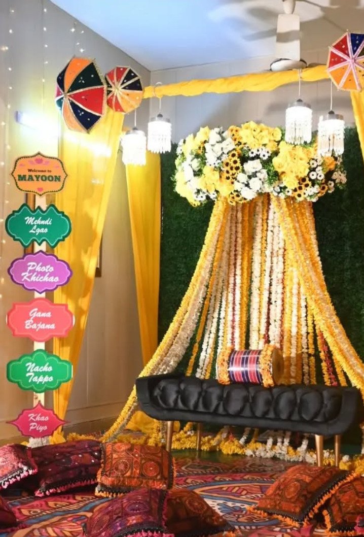 Orange and gold mehndi stage decoration in Sialkot – Events In Sialkot