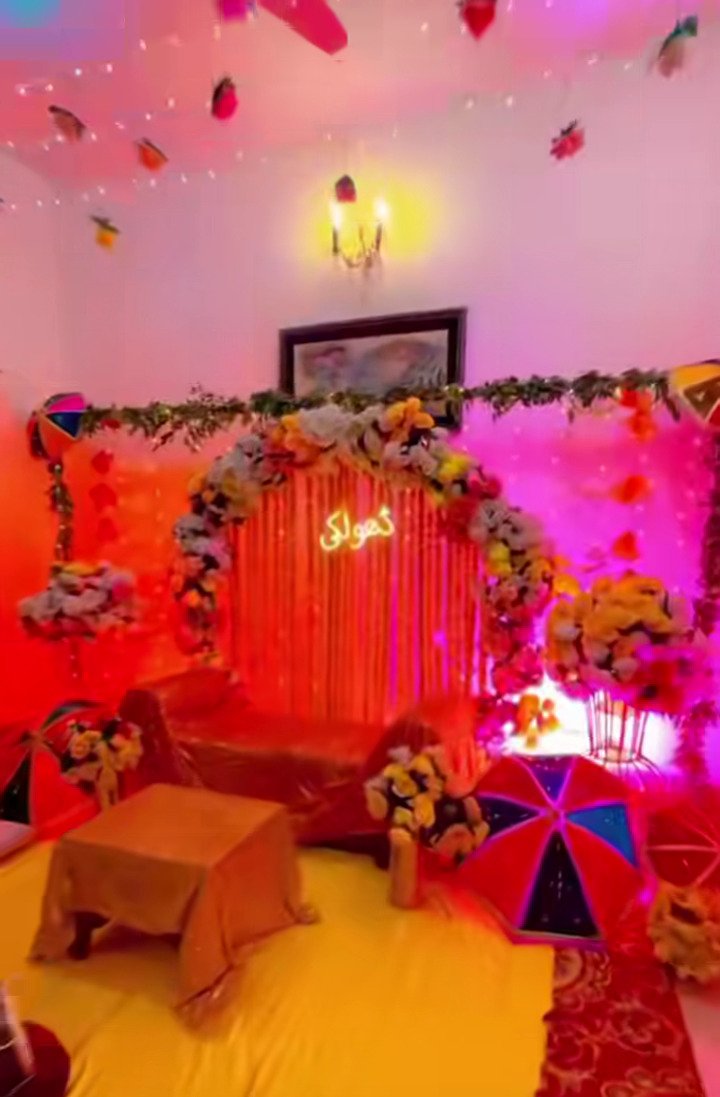 Red and orange mehndi stage decoration in Sialkot – Events In Sialkot