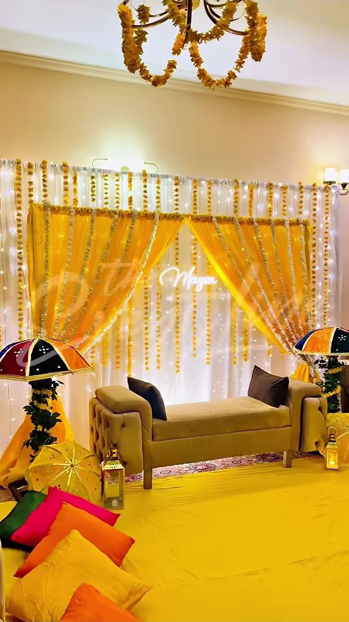 Gold and orange mehndi stage decoration in Sialkot – Events In Sialkot