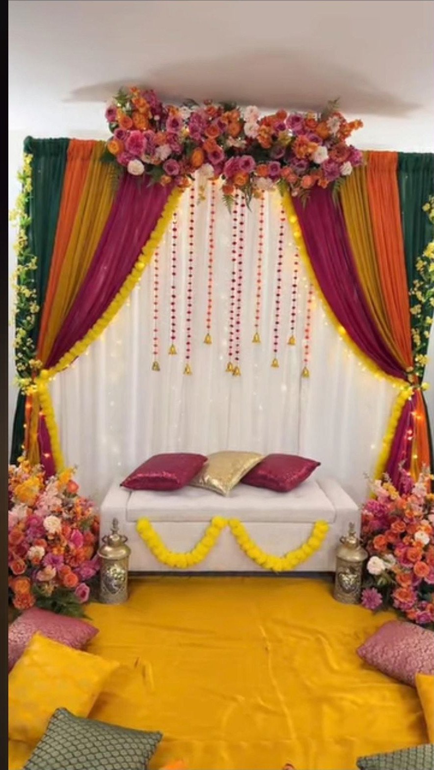 Orange and gold mehndi stage decoration in Sialkot – Events In Sialkot