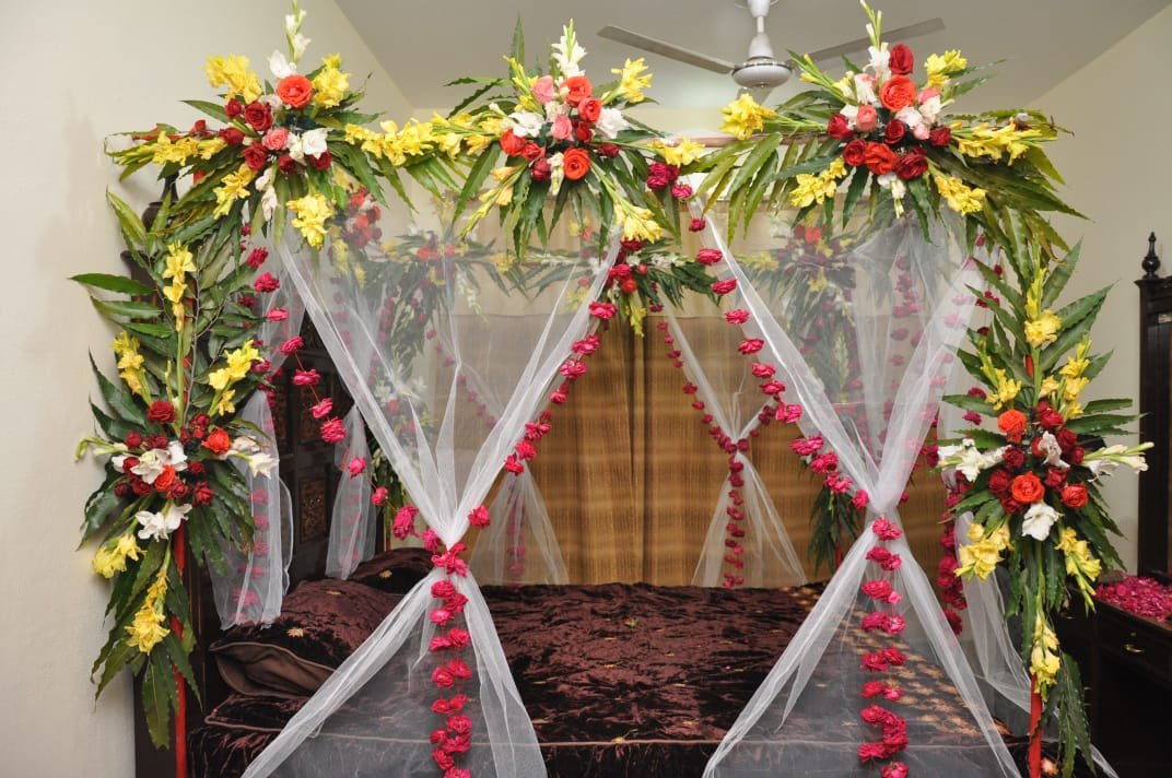 Gold and white bridal room flower canopy in Sialkot – Events In Sialkot