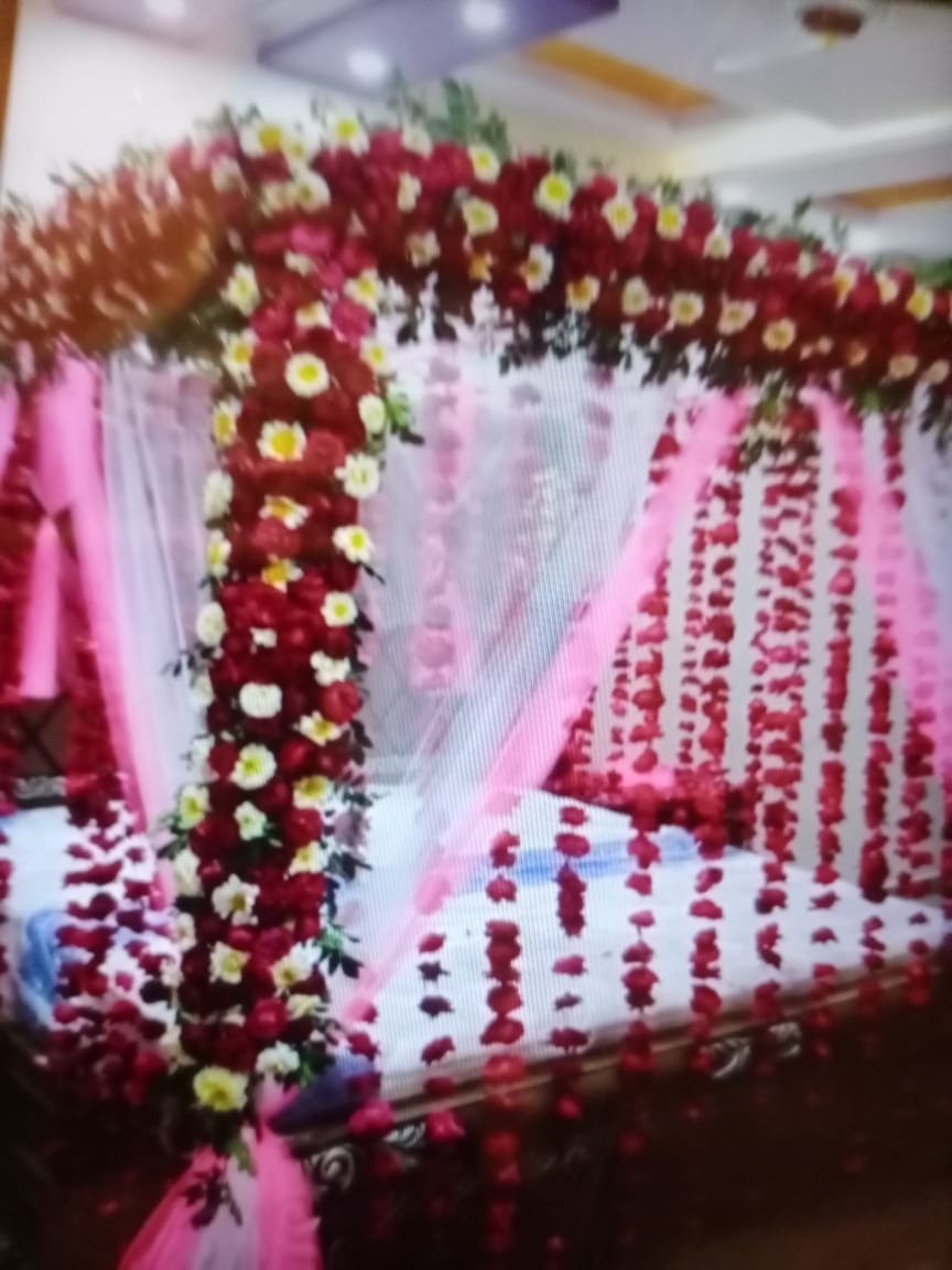 Maroon and pink bridal room flower canopy in Sialkot – Events In Sialkot