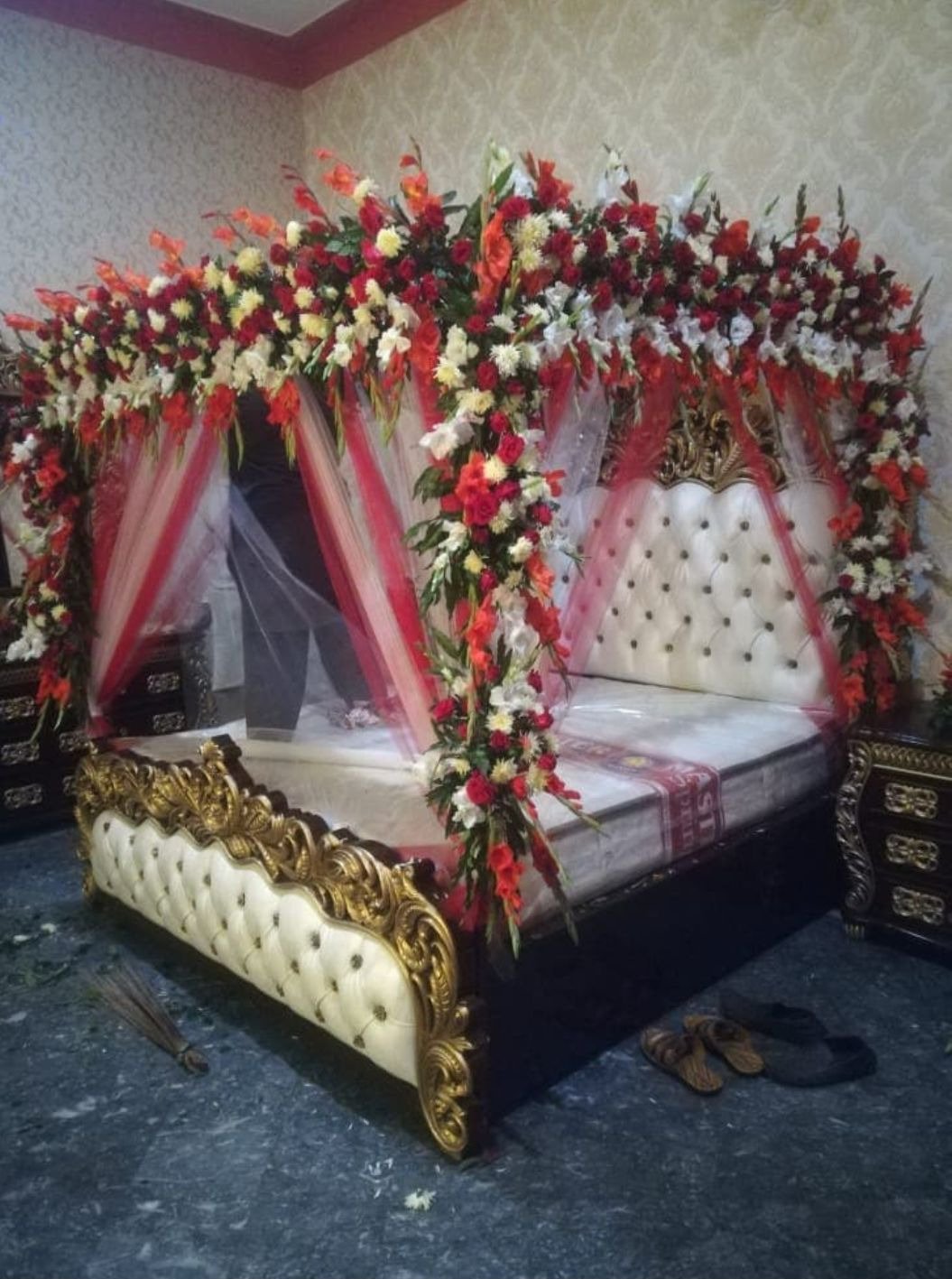 Maroon and red bridal room flower canopy in Sialkot – Events In Sialkot