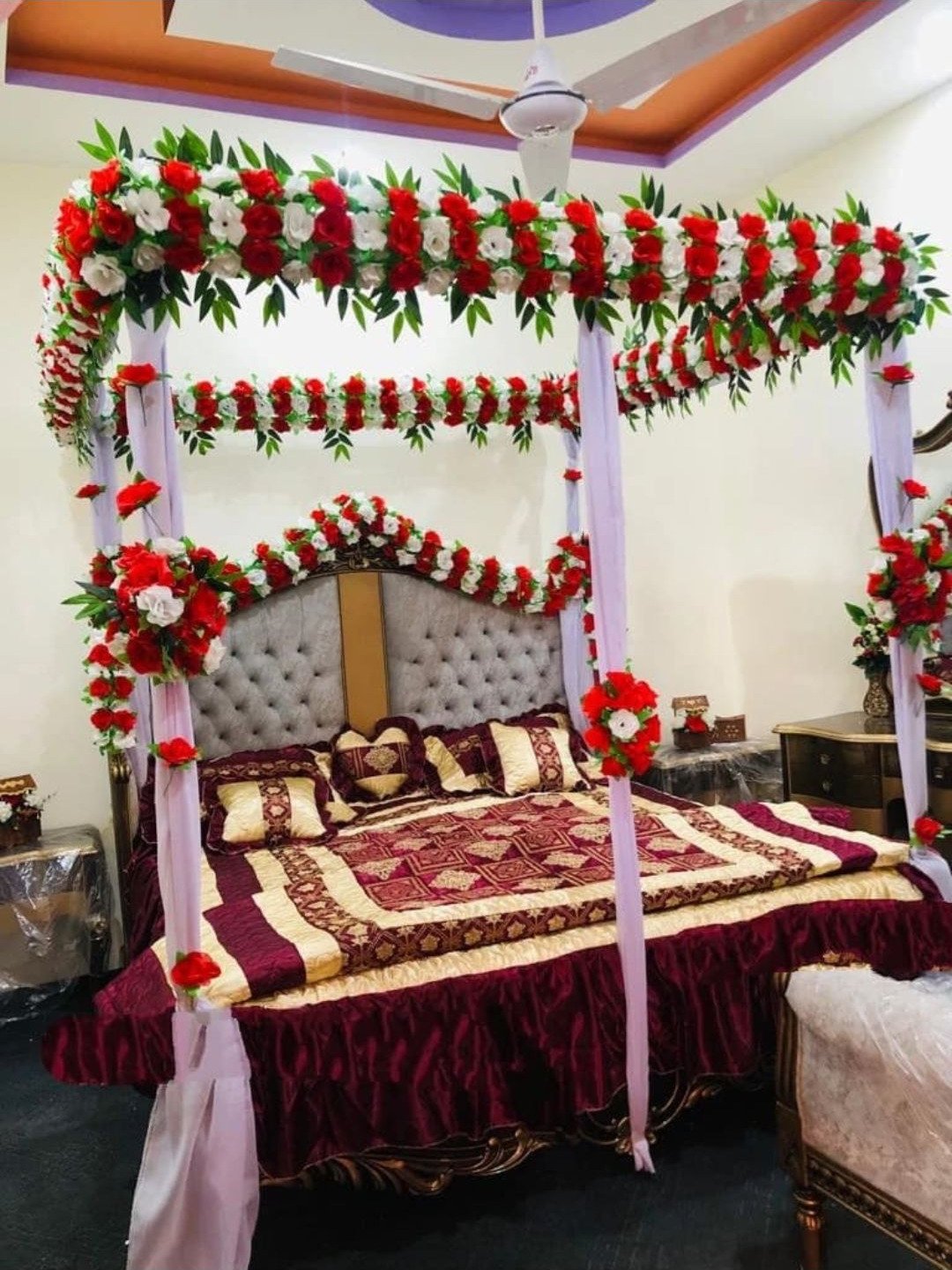 White and red bridal room flower canopy in Sialkot – Events In Sialkot